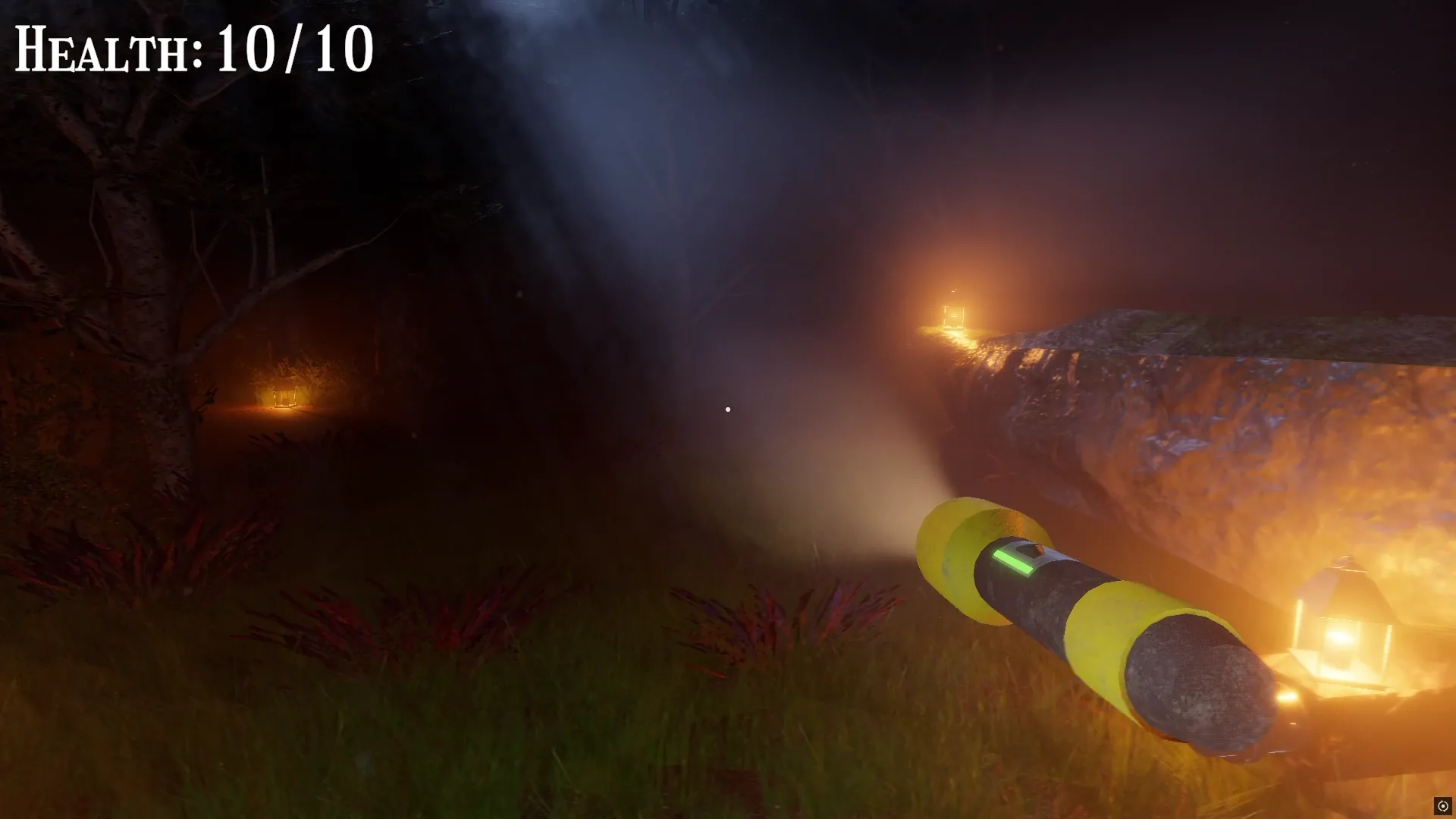 Hellhound's Trail: the player's flashlight beam cutting through the woods at night.